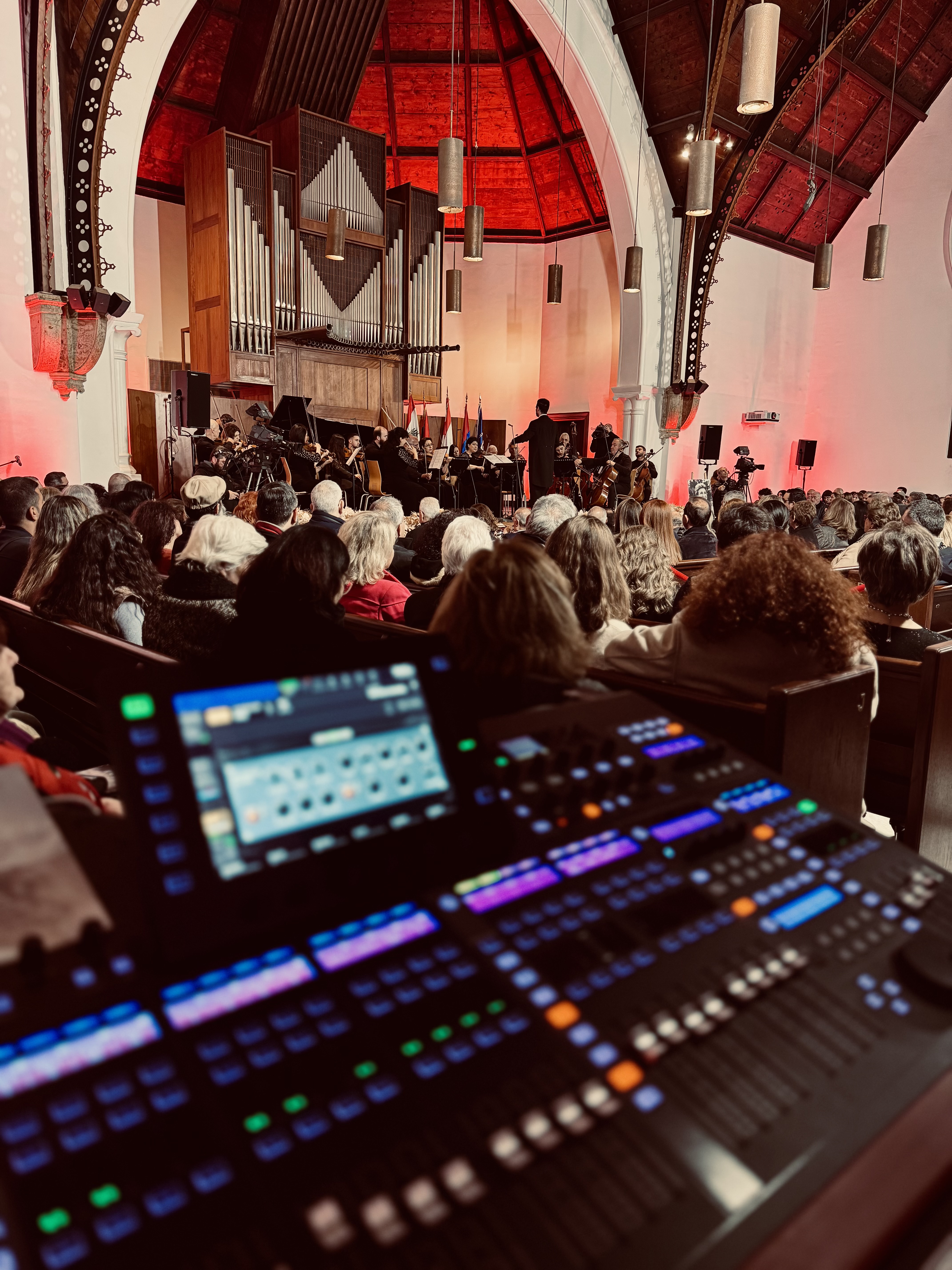 FOH desk at church concert with organ